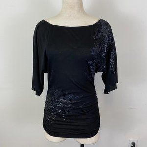 Black top with scrunch sides and printed designs